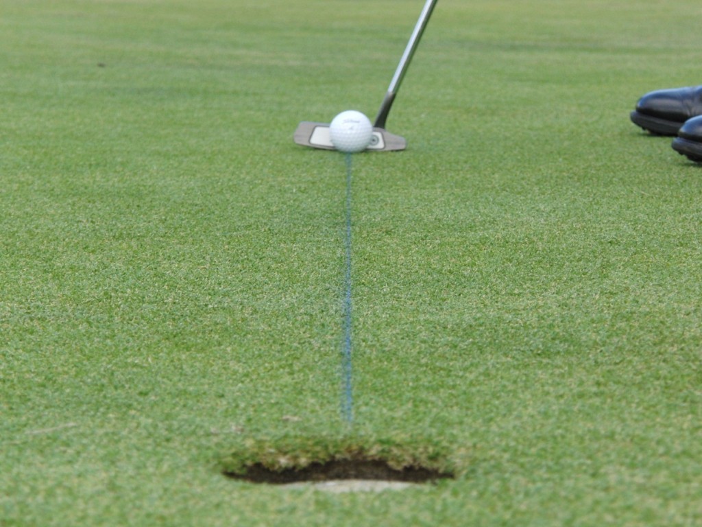 PUTTING DRILL Putt Down a Chalk Line